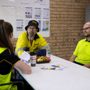 Truckie chatting with woman